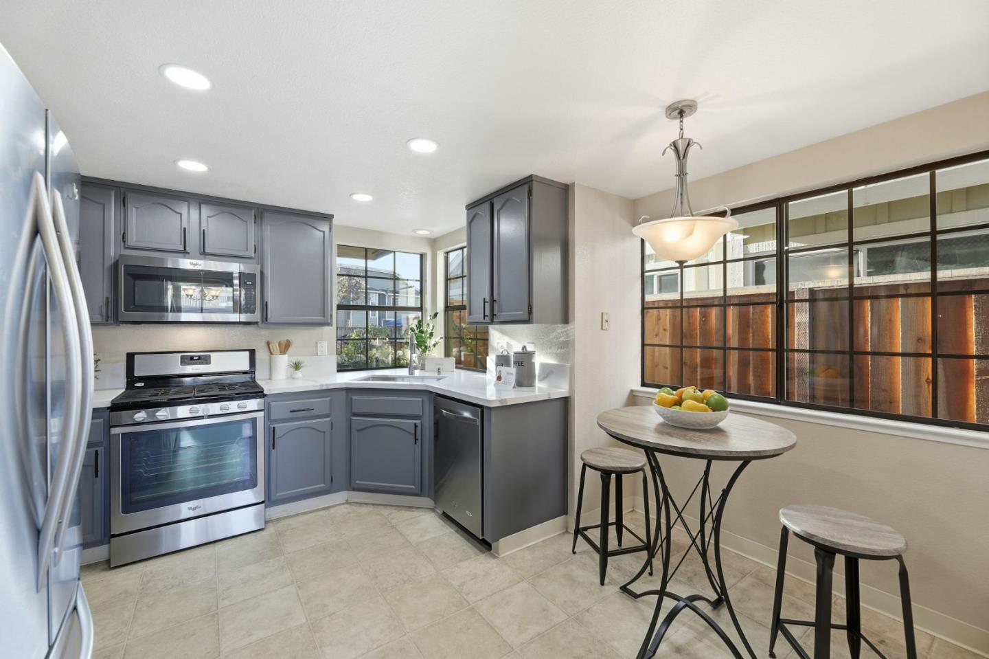 650 Folsom Circle Milpitas, CA 95035 - Photo 12 of 45 a kitchen with a sink appliances and cabinets