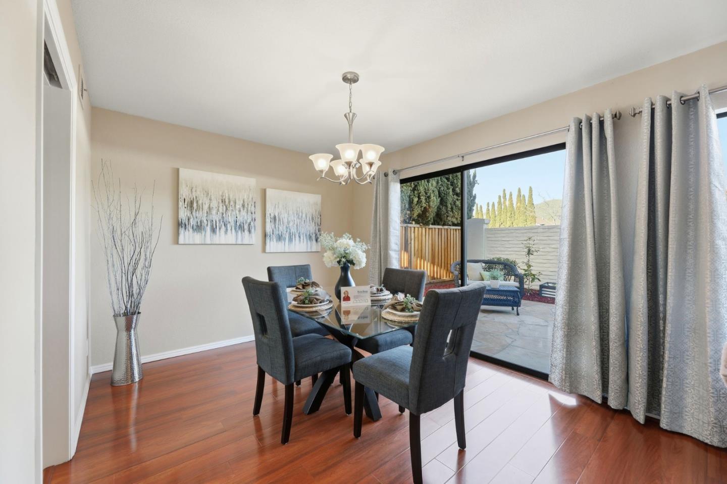 650 Folsom Circle Milpitas, CA 95035 - Photo 14 of 45 a view of a dining room with furniture window and wooden floor