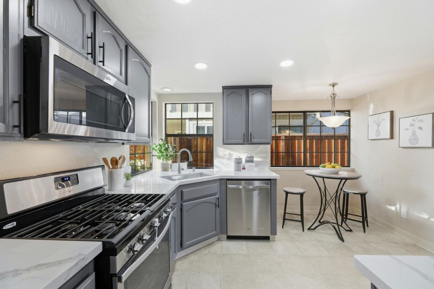 650 Folsom Circle Milpitas, CA 95035 - Photo 10 of 45 a kitchen with lots of counter top space and appliances