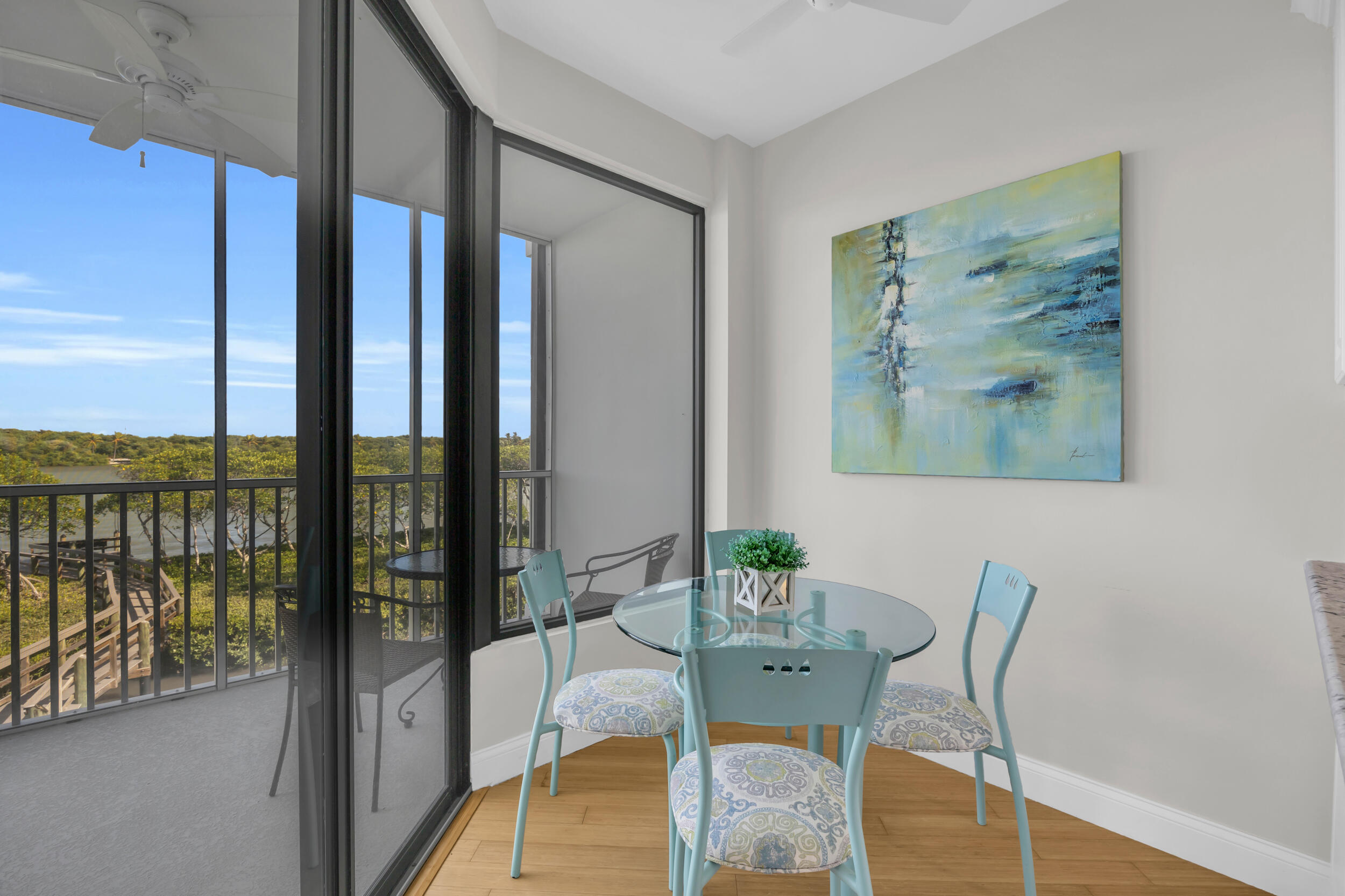 200 Waterway Road, Unit 206 Tequesta, FL 33469 - Photo 11 of 49 a view of a dining room with furniture window and outside view