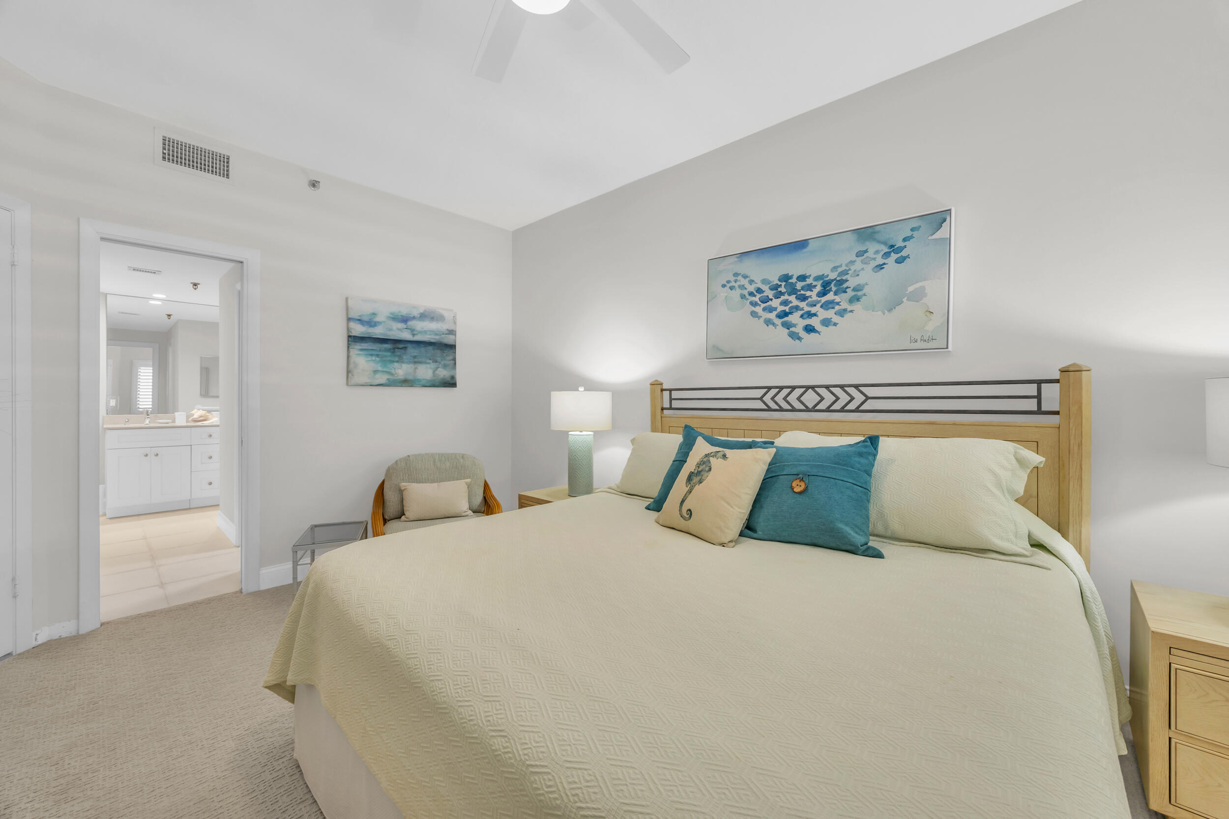 200 Waterway Road, Unit 206 Tequesta, FL 33469 - Photo 30 of 49 a bedroom with a bed and painting on the wall