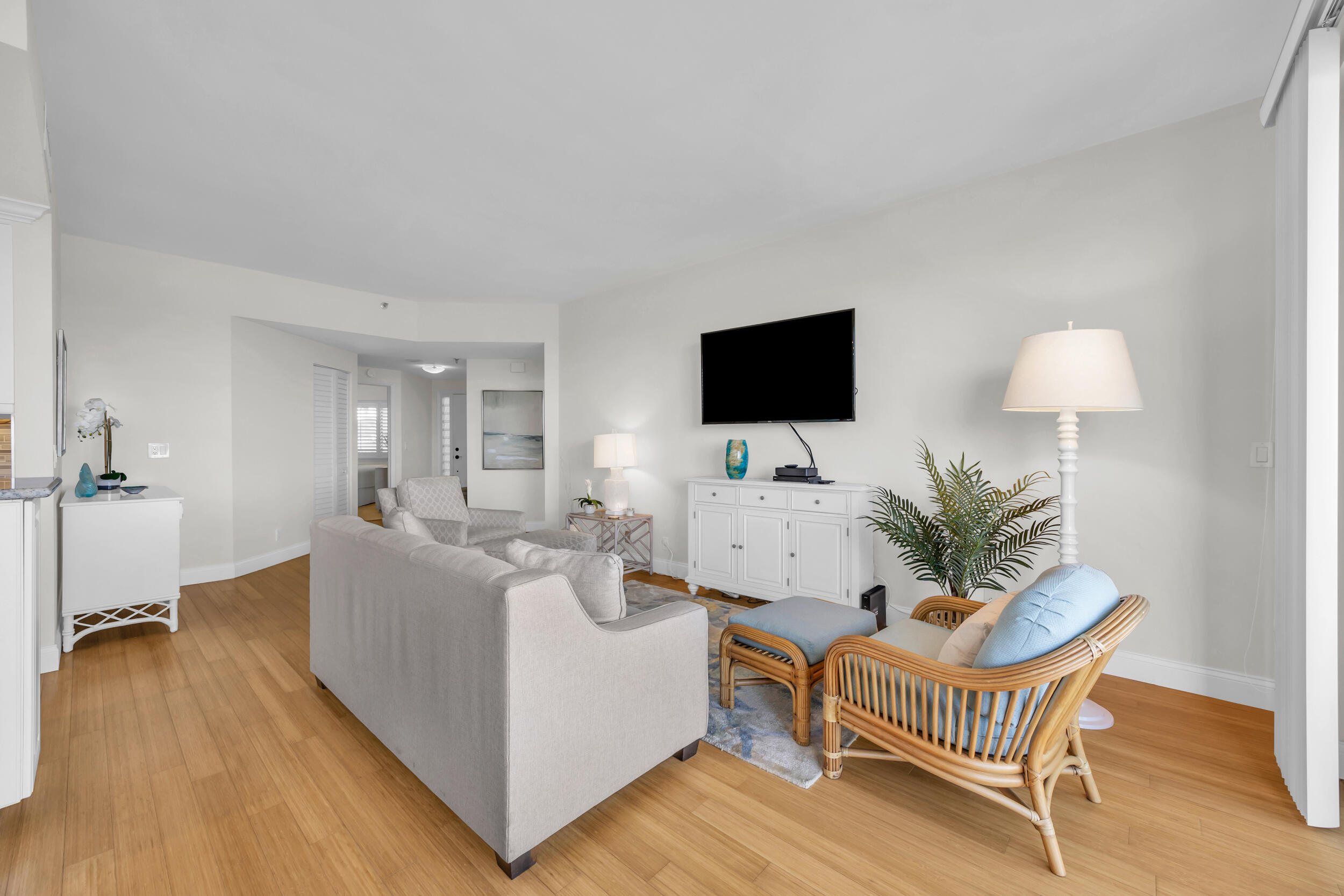 200 Waterway Road, Unit 206 Tequesta, FL 33469 - Photo 6 of 49 a living room with furniture and a flat screen tv