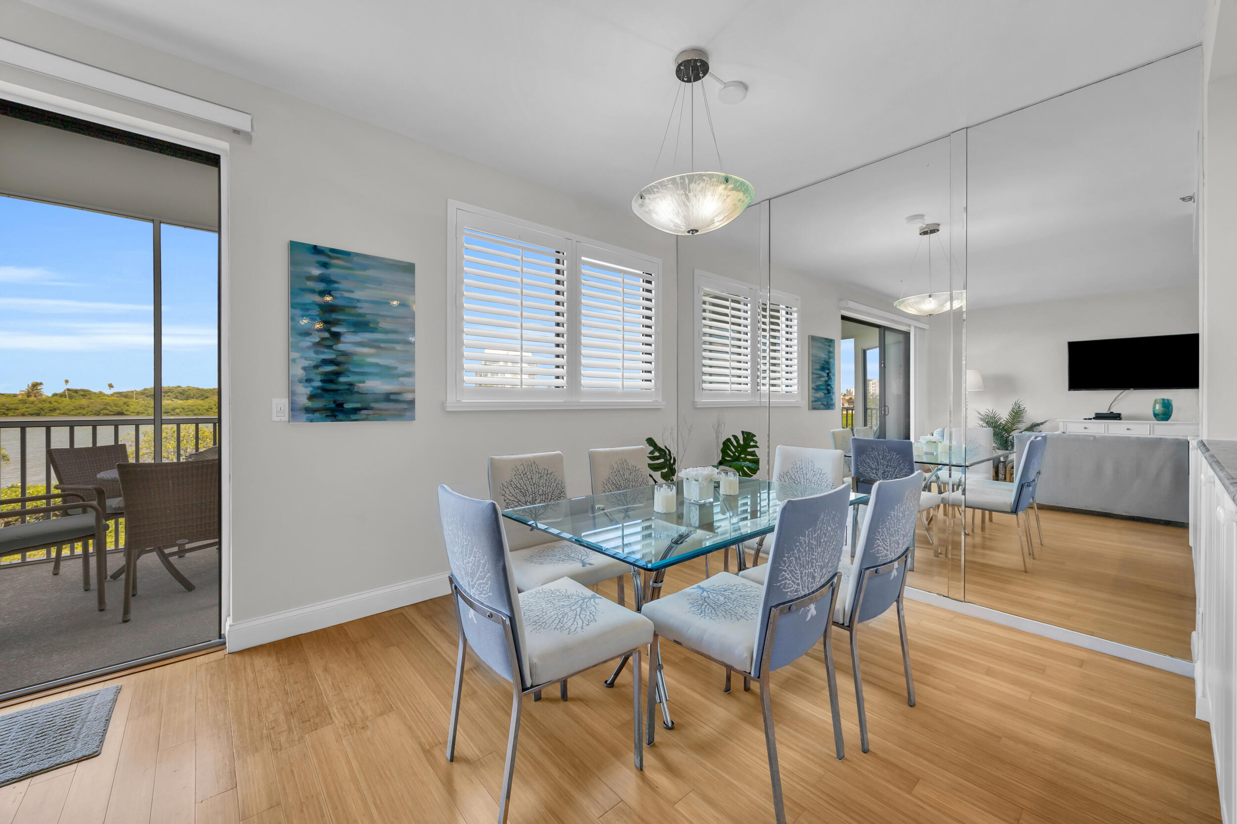 200 Waterway Road, Unit 206 Tequesta, FL 33469 - Photo 9 of 49 a view of a dining room with furniture window and outside view