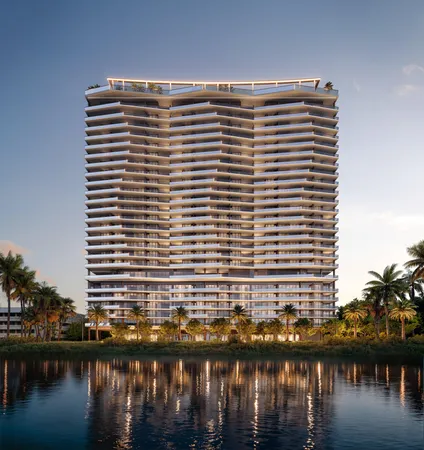 a view of a lake with a large building in front of it
