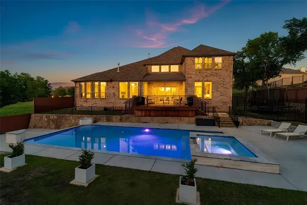 a living room with furniture pool table and a garden