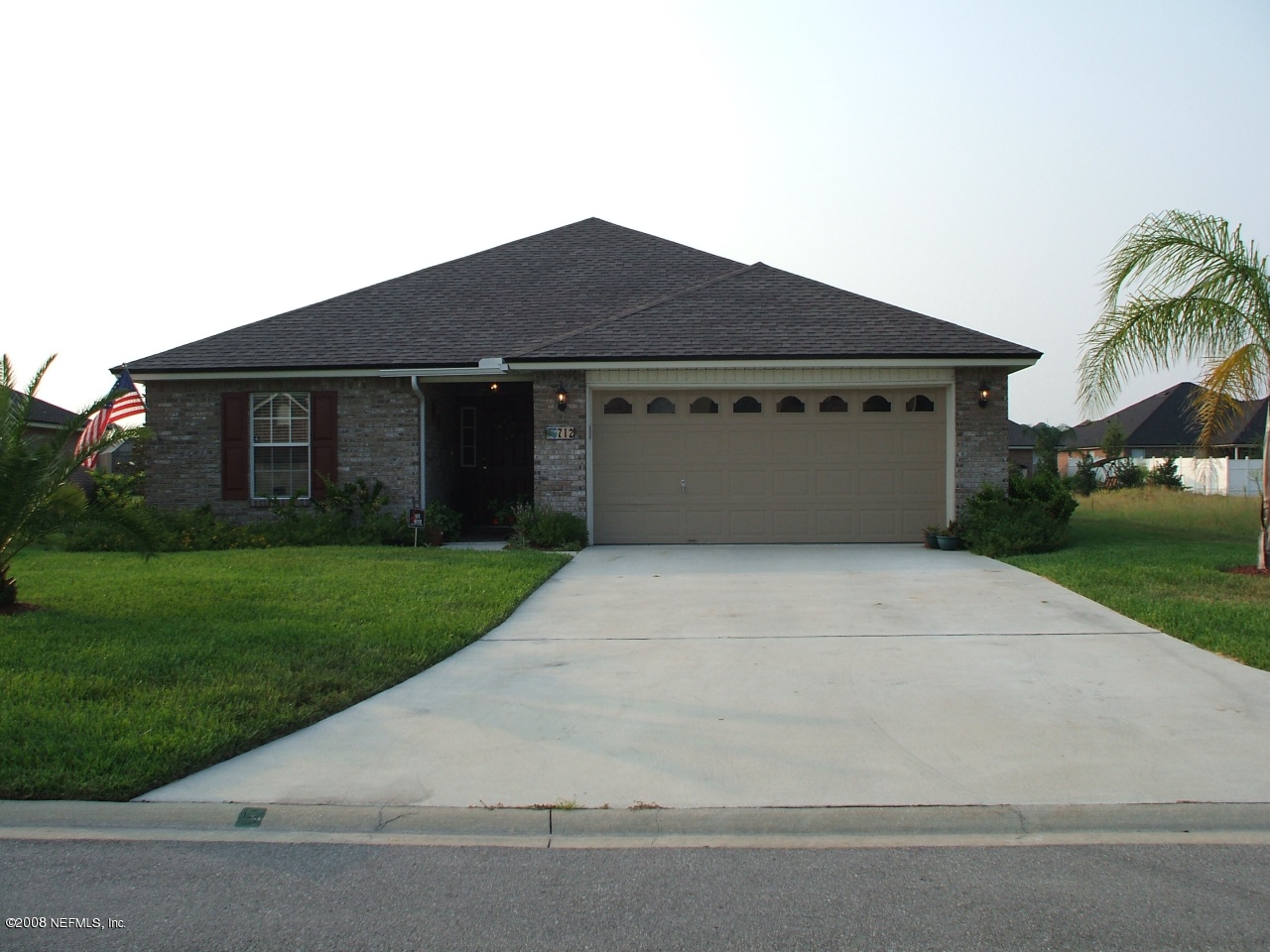 a front view of house with yard