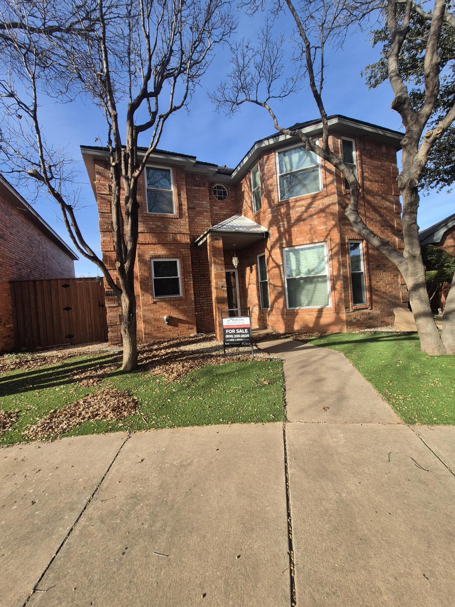 5117 79th Drive Lubbock, TX 79424 - Photo 1 of 35 a front view of house with yard