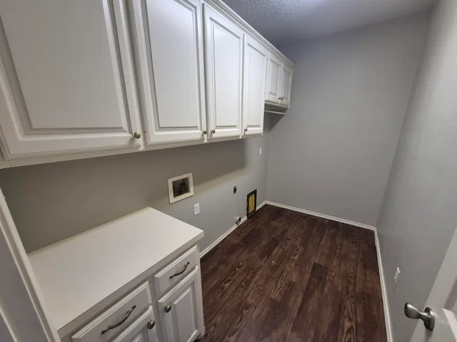 a view of storage and utility room with washer and dryer