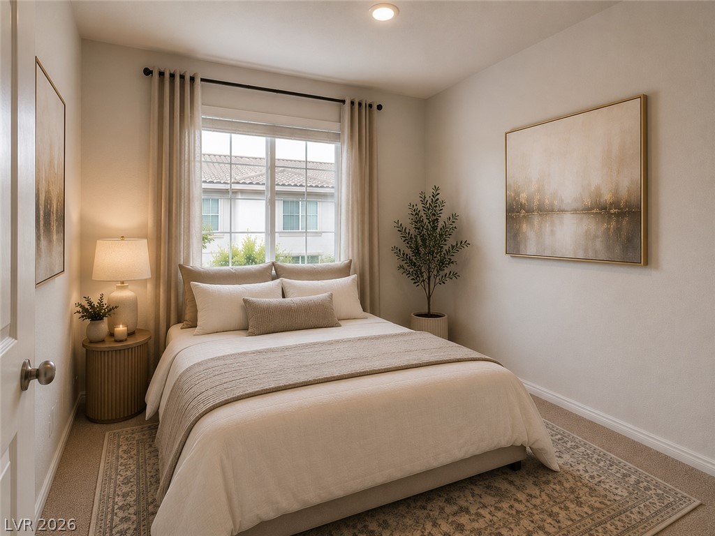 7330 North Decatur Boulevard, Unit 6 North Las Vegas, NV 89084 - Photo 13 of 42 A well-lit bedroom features plush carpeting and a large window providing ample natural light.