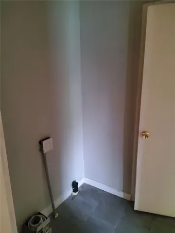 a view of room with air conditioner and window