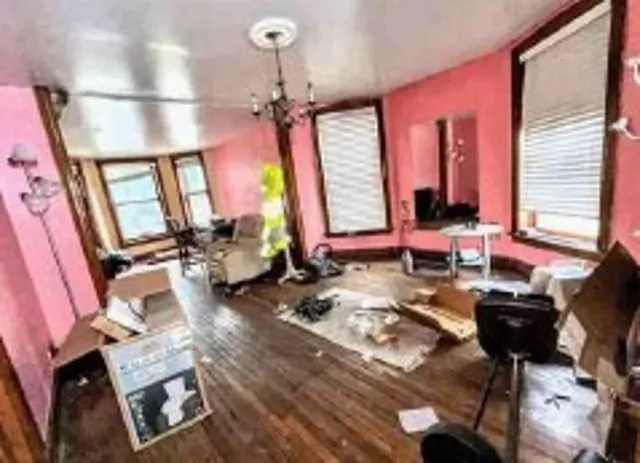 a room with furniture and a window