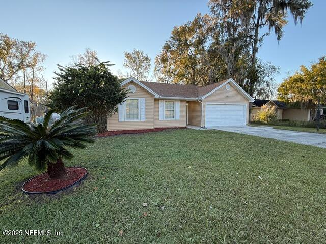 2160 Rothbury Drive Jacksonville, FL 32221 - Photo 37 of 38 a view of a house with a yard and potted plants