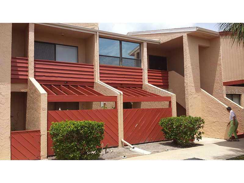 1 Windrush Boulevard, Unit 104 Indian Rocks Beach, FL 33785 - Photo 1 of 1 Exterior Front