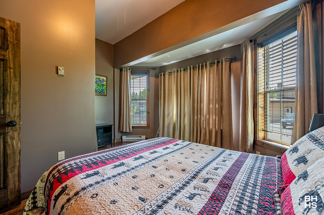 6143 Sentinel Road, Unit # 1 Lake Placid, NY 12946 - Photo 7 of 19 Downhill1Condo_Summer_Bedroom1_Windows