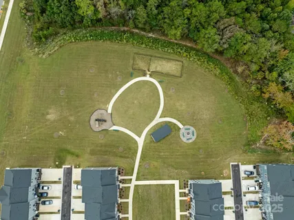 a aerial view of a house with a lake view
