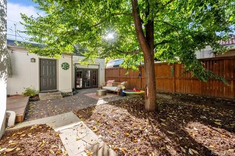 a view of yard with patio