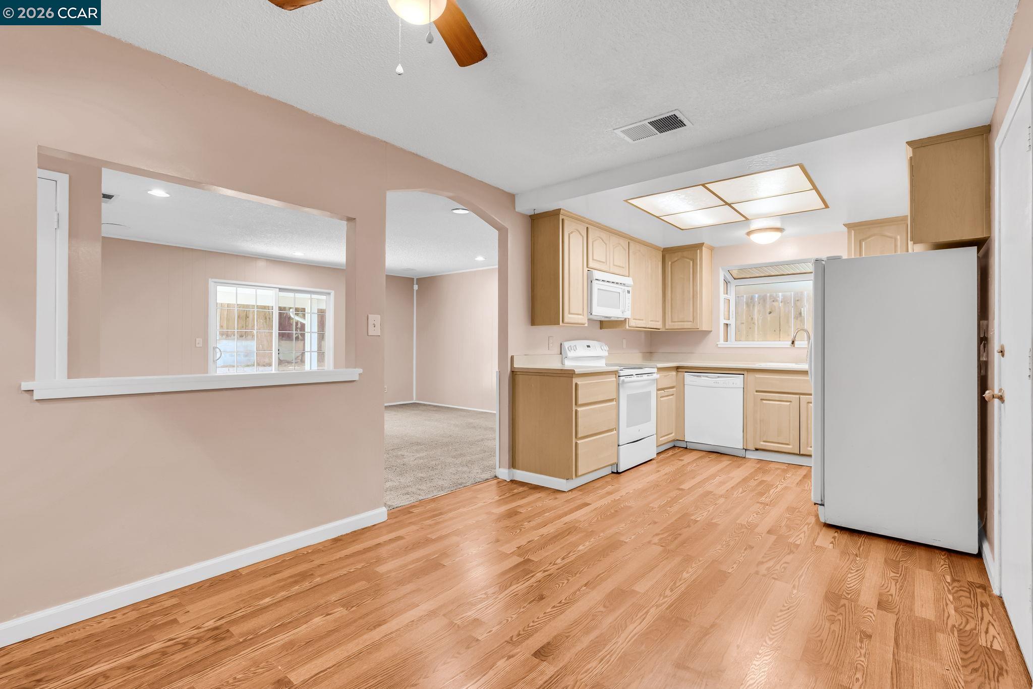 3321 Fraser Road Antioch, CA 94509 - Photo 13 of 46 a view of a kitchen with wooden floor