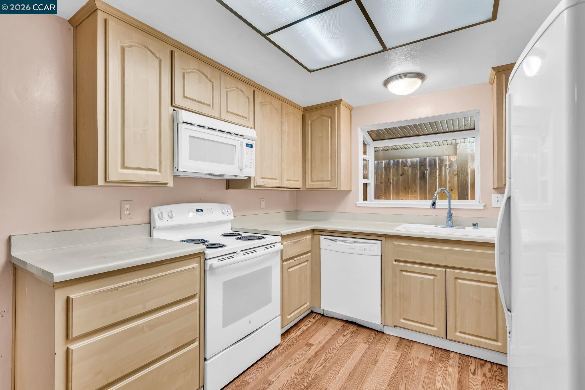 3321 Fraser Road Antioch, CA 94509 - Photo 16 of 46 a kitchen with appliances cabinets and a sink