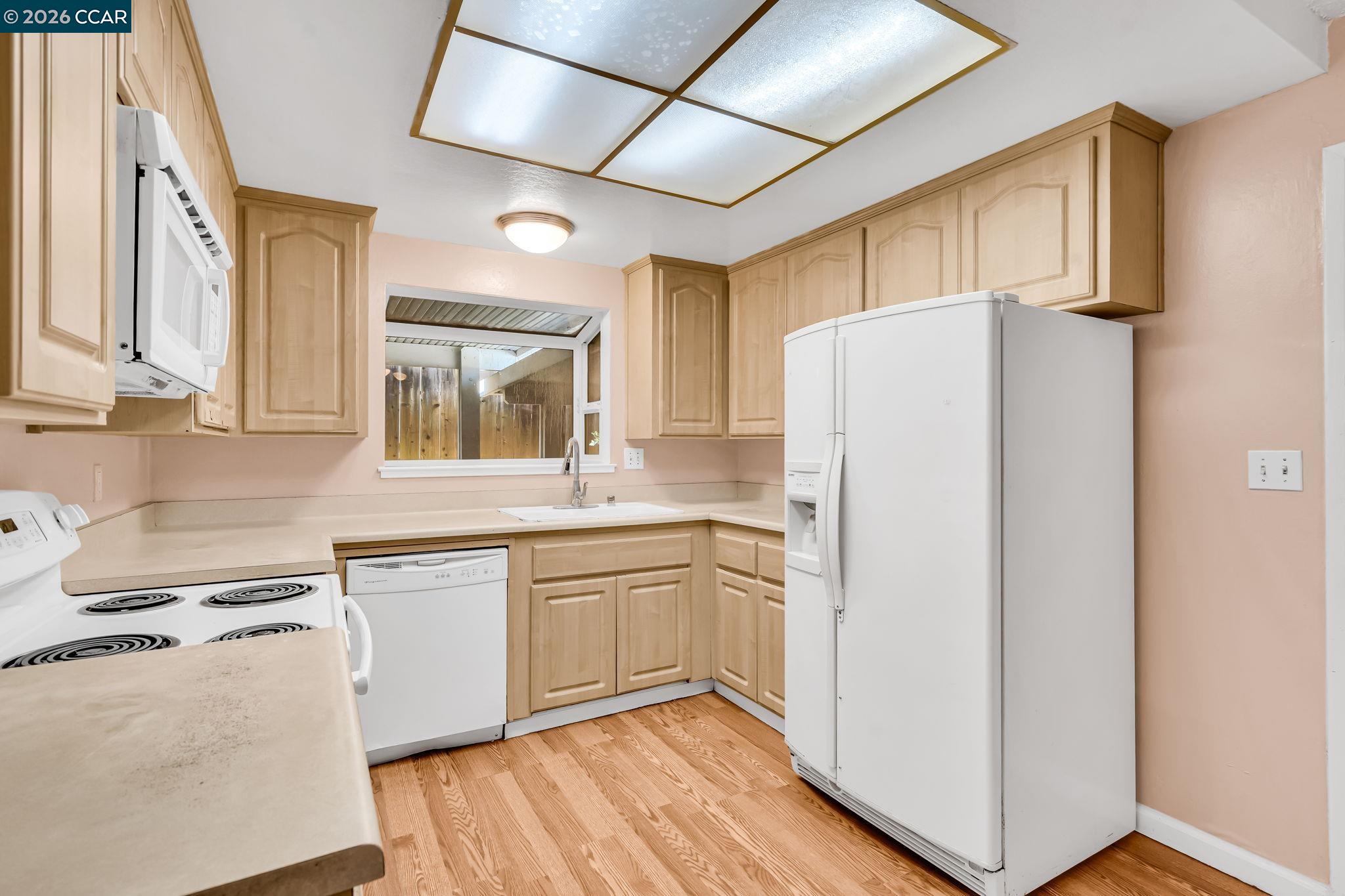3321 Fraser Road Antioch, CA 94509 - Photo 18 of 46 a kitchen with stainless steel appliances a refrigerator and a sink