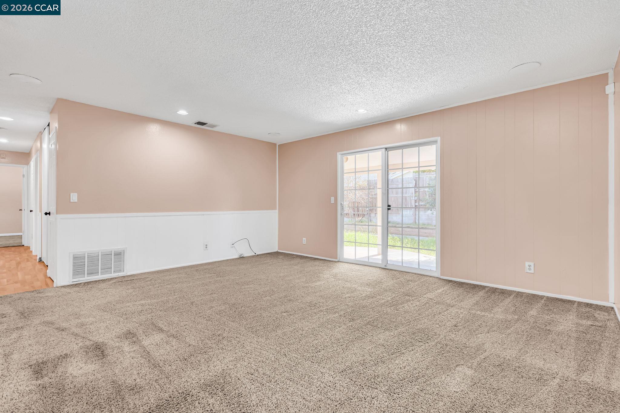 3321 Fraser Road Antioch, CA 94509 - Photo 10 of 46 a view of an empty room with a window