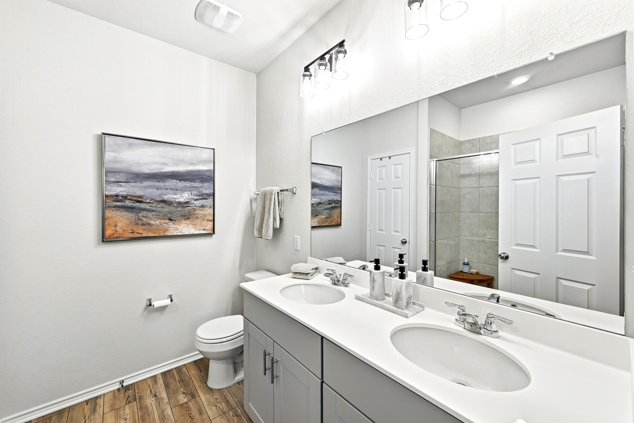 462 Tree Nut Loop Buda, TX 78610 - Photo 19 of 38 The dual vanity offers two separate sink areas and plenty of storage for daily essentials