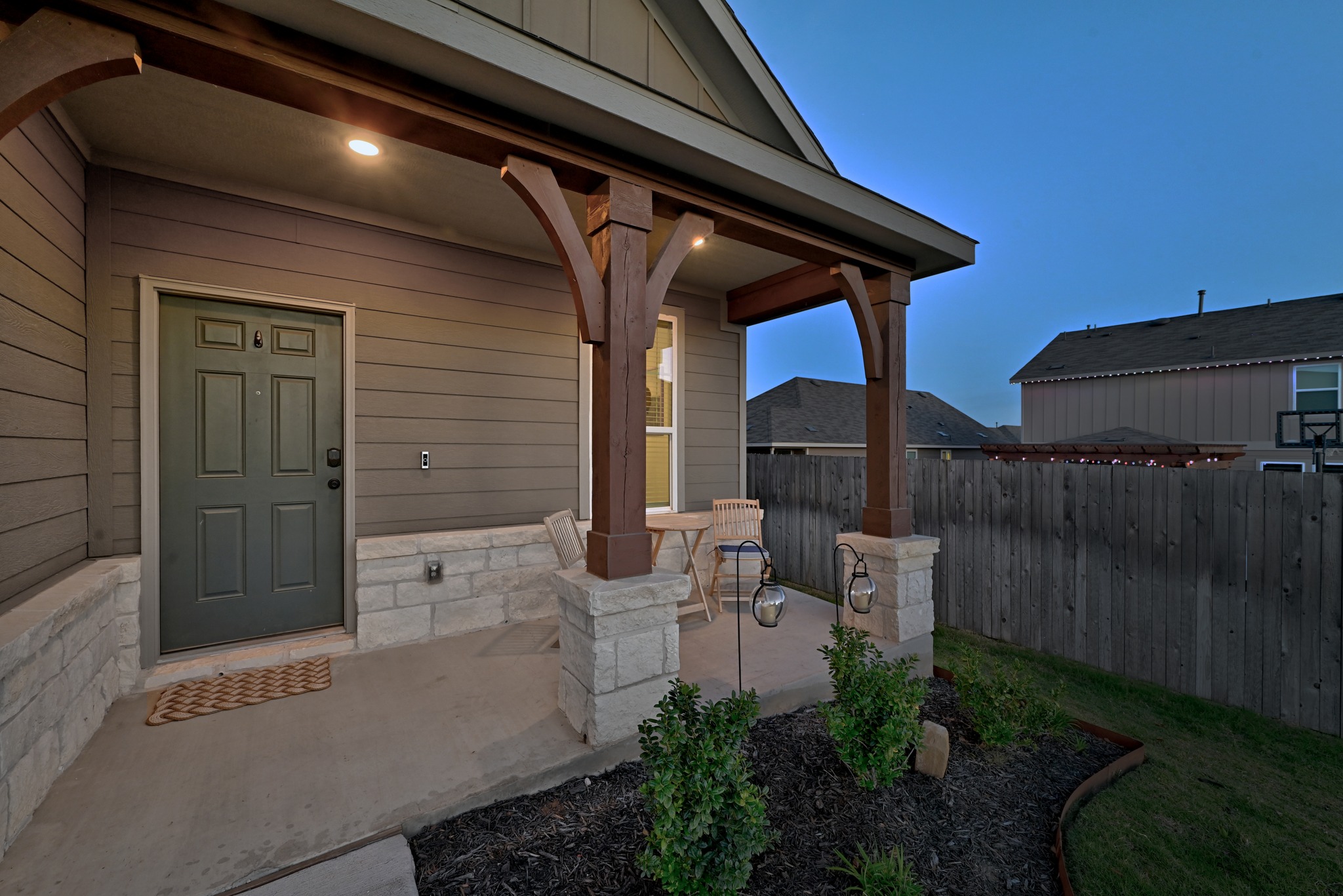 462 Tree Nut Loop Buda, TX 78610 - Photo 8 of 38 The covered front porch is a great spot to set out a couple of chairs and take in the quiet street here in Sunfield