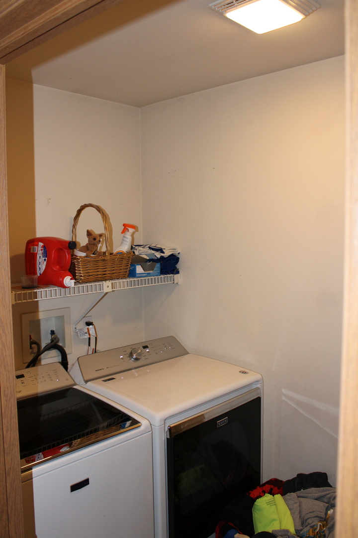 245 Rollin Road, Unit D Somonauk, IL 60552 - Photo 23 of 29 a utility room with dryer and washer
