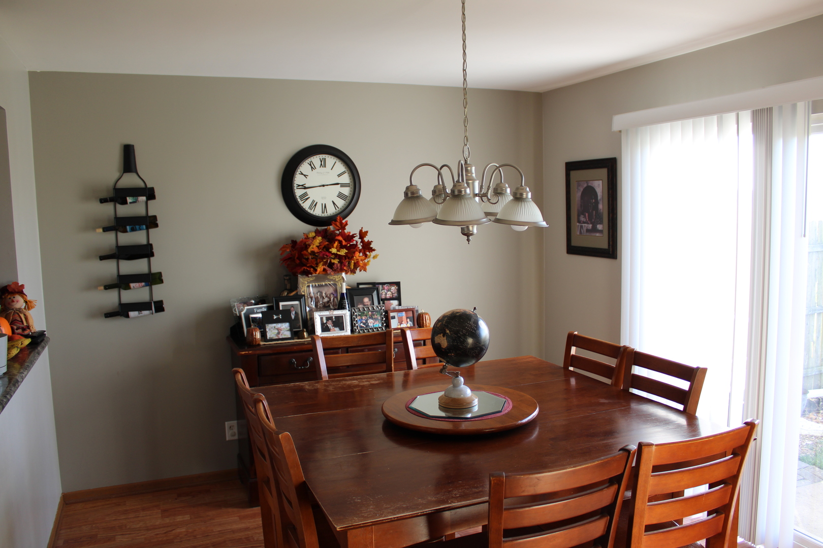 245 Rollin Road, Unit D Somonauk, IL 60552 - Photo 6 of 29 a view of a dining room with furniture and chandelier