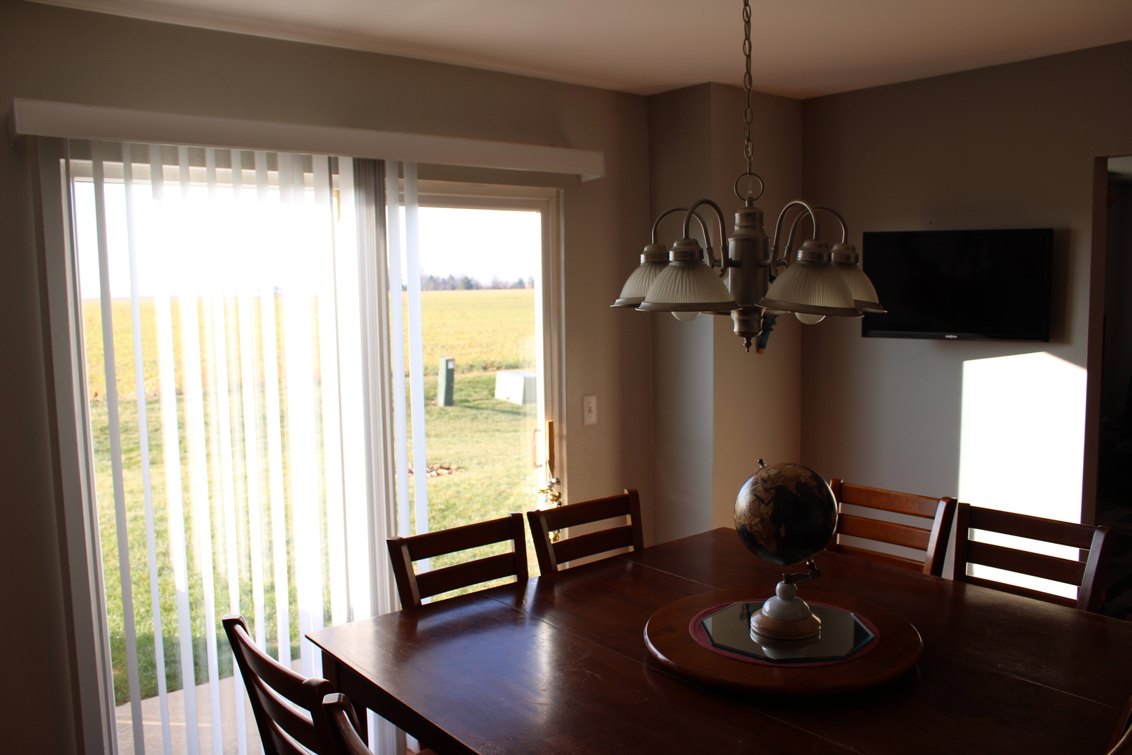 245 Rollin Road, Unit D Somonauk, IL 60552 - Photo 7 of 29 a view of a dining room with furniture window and outside view