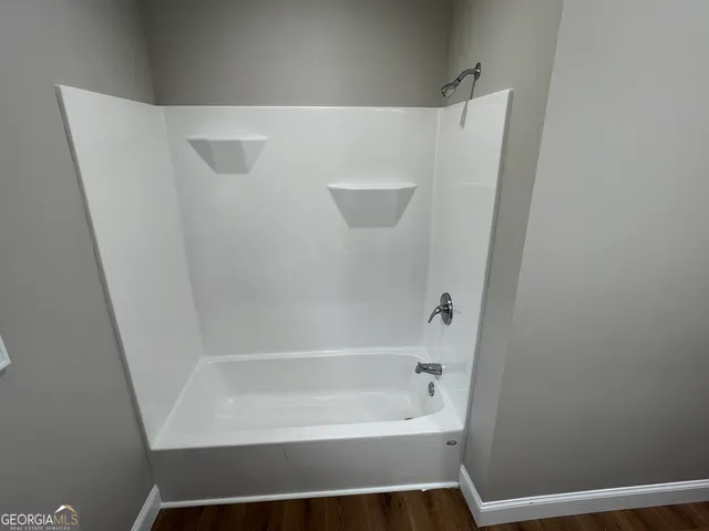 a bathroom with a bathtub
