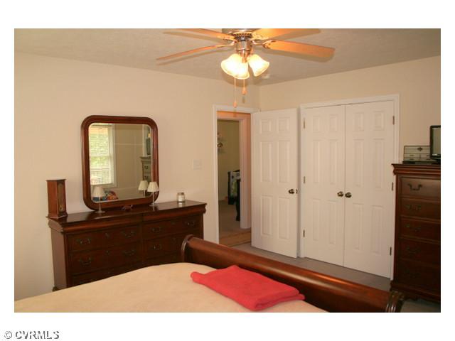 1168 Epworth Road Aylett, VA 23009 - Photo 13 of 21 Master Bedroom - The large double closet will be able to provide for all of your storage needs.