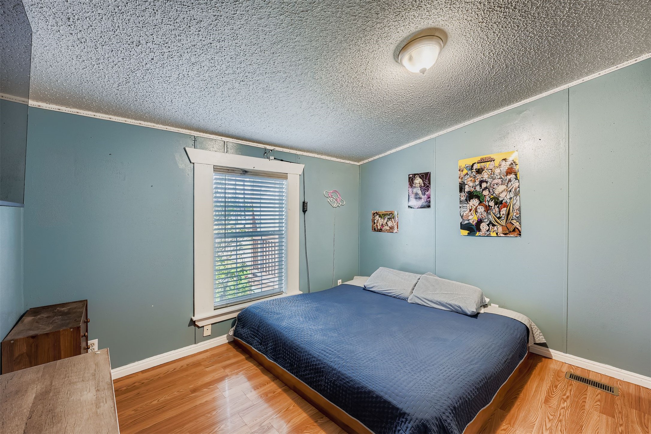 145 Alyssa Loop Bastrop, TX 78602 - Photo 22 of 40 a bedroom with a bed and a window