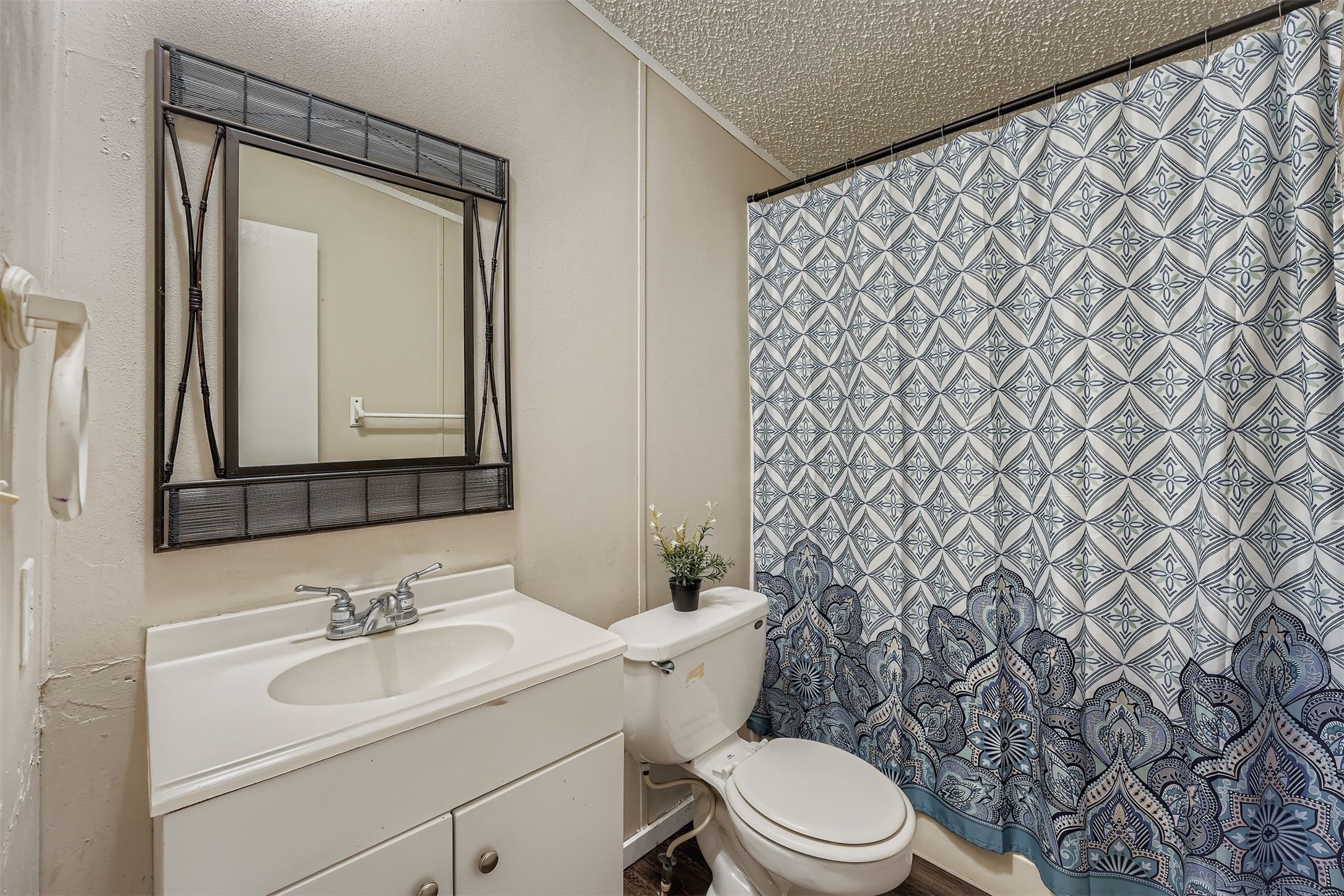 145 Alyssa Loop Bastrop, TX 78602 - Photo 24 of 40 a bathroom with a sink and a mirror