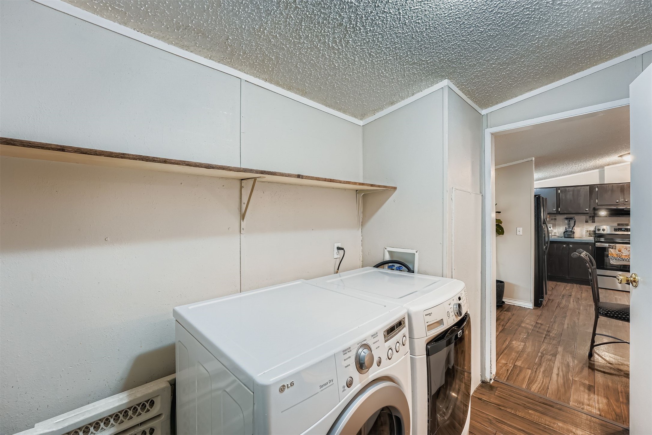 145 Alyssa Loop Bastrop, TX 78602 - Photo 28 of 40 a utility room with dryer and washer