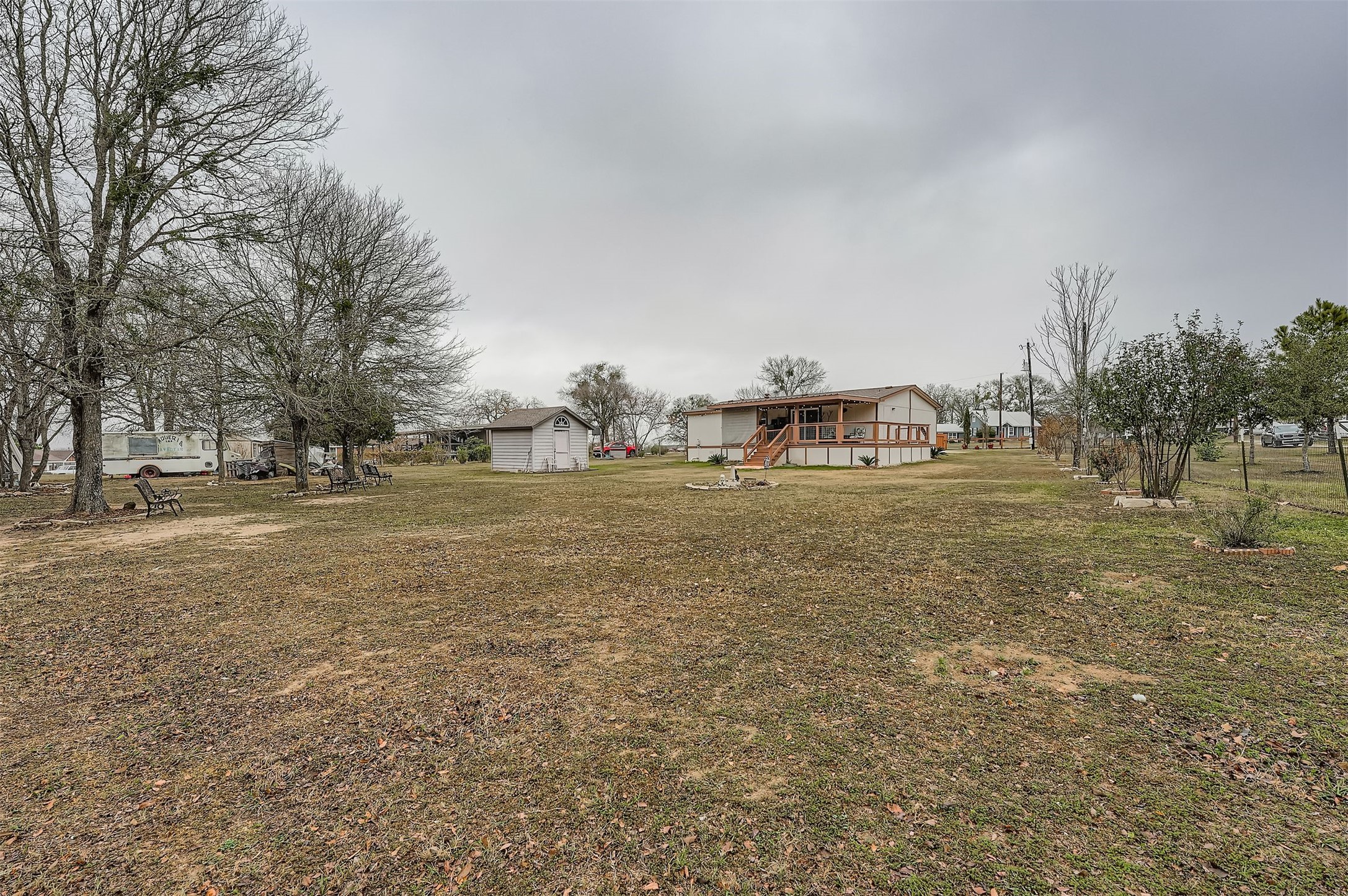 145 Alyssa Loop Bastrop, TX 78602 - Photo 31 of 40 a view of dirt field with trees