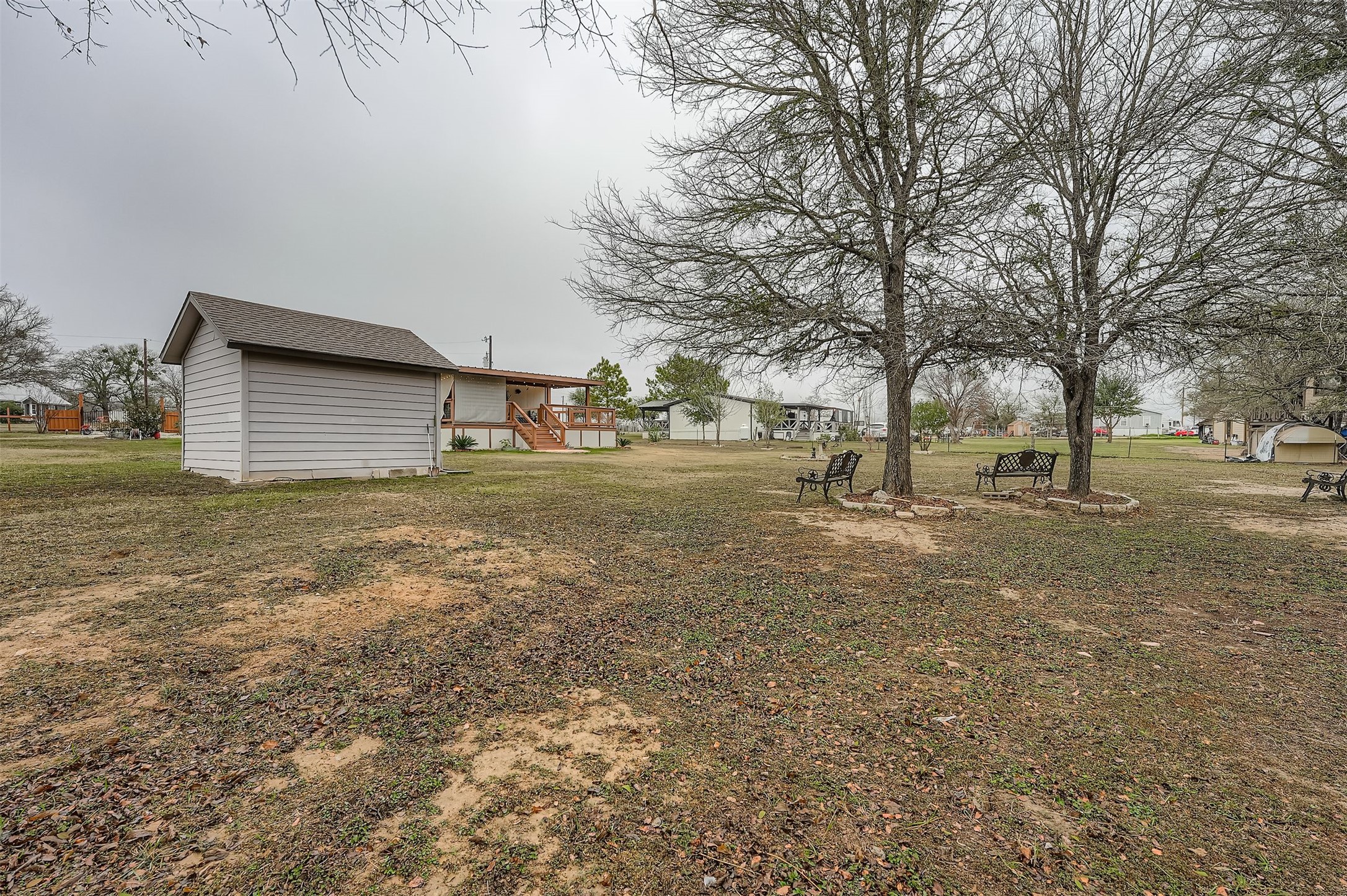 145 Alyssa Loop Bastrop, TX 78602 - Photo 32 of 40 a view of a yard with a tree