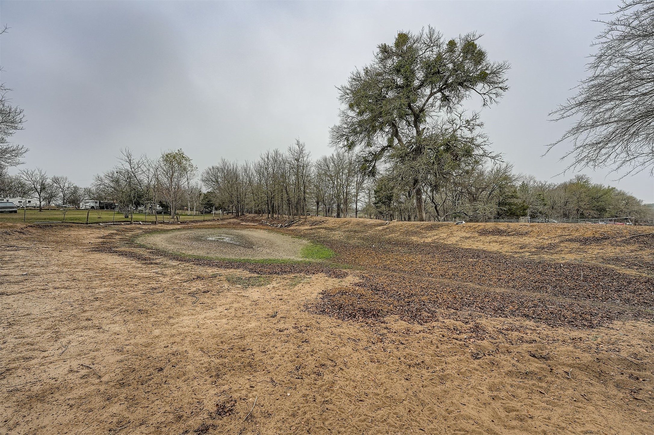 145 Alyssa Loop Bastrop, TX 78602 - Photo 33 of 40 a view of a field with trees around