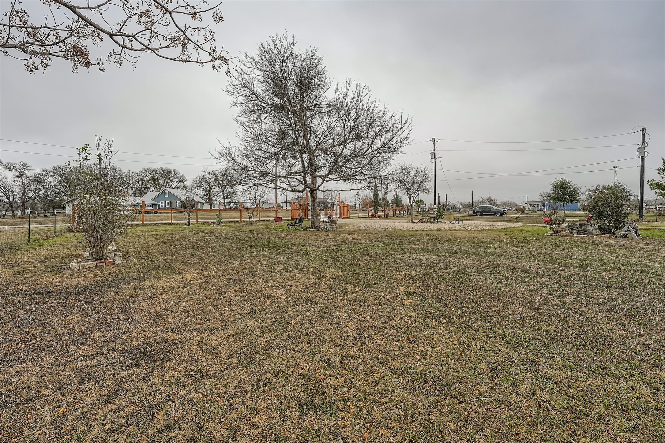 145 Alyssa Loop Bastrop, TX 78602 - Photo 34 of 40 a view of a water with a building in the background
