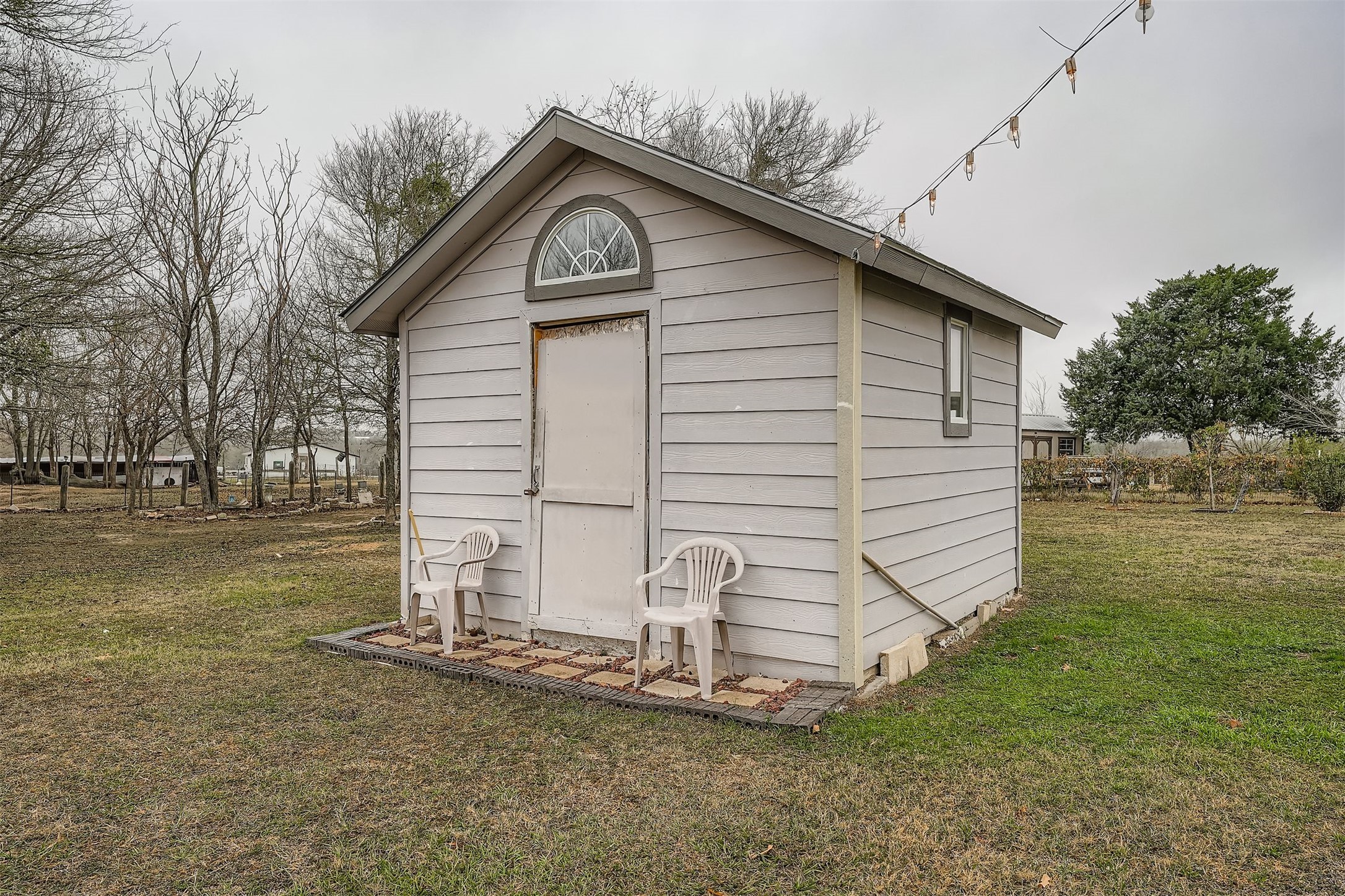 145 Alyssa Loop Bastrop, TX 78602 - Photo 37 of 40 a view of a house with a yard