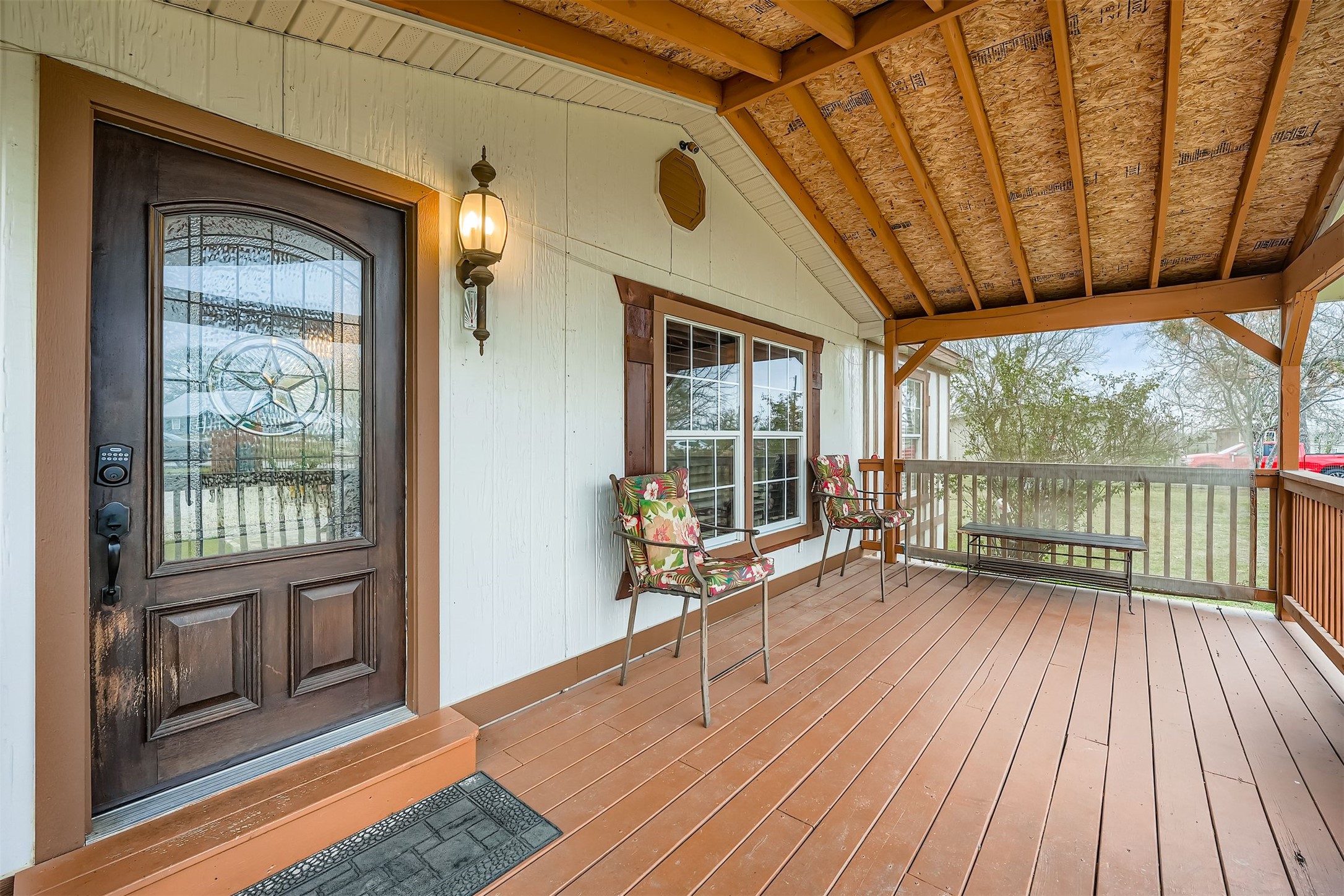 145 Alyssa Loop Bastrop, TX 78602 - Photo 5 of 40 a view of a room with wooden floor and windows