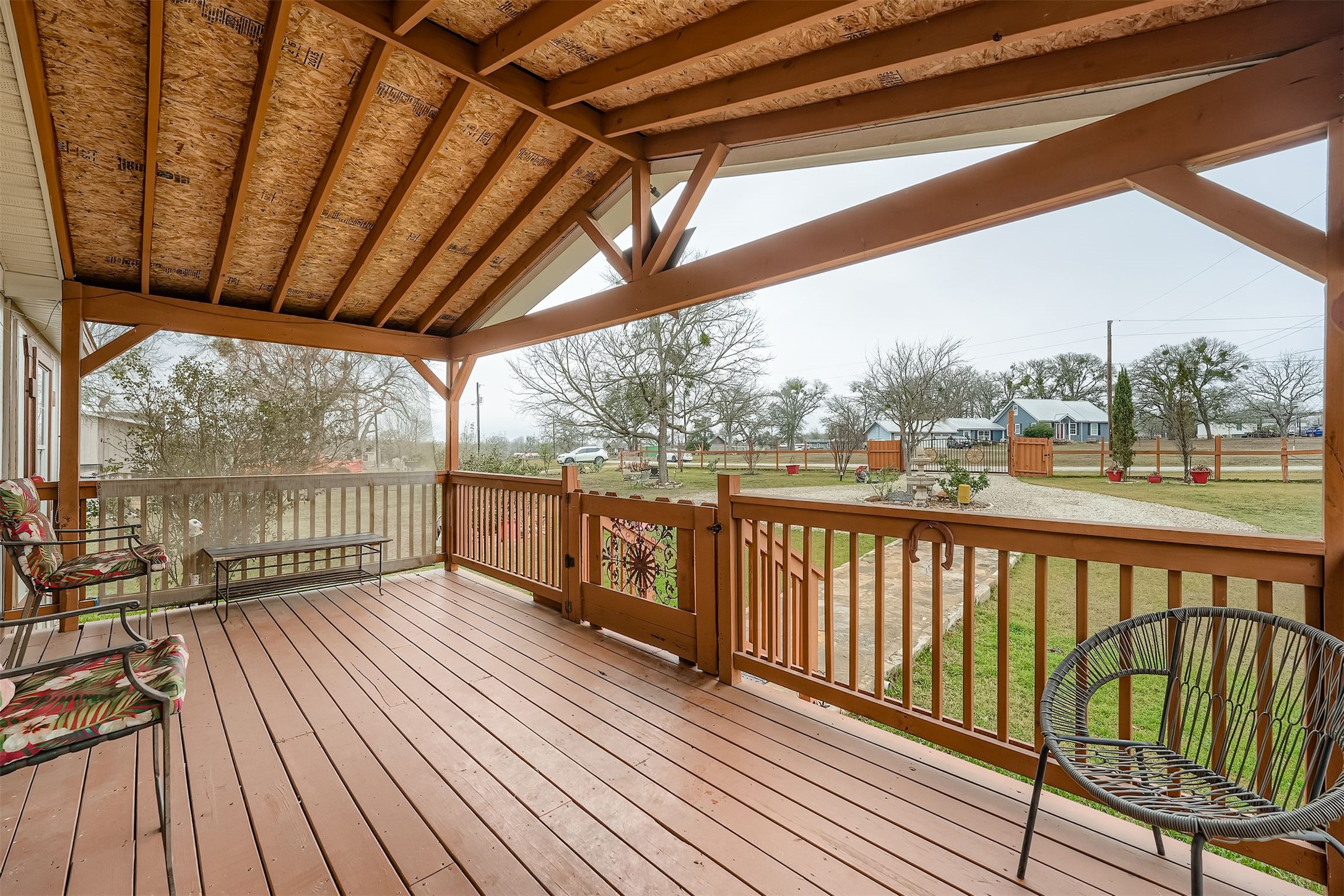 145 Alyssa Loop Bastrop, TX 78602 - Photo 7 of 40 a view of balcony with wooden floor