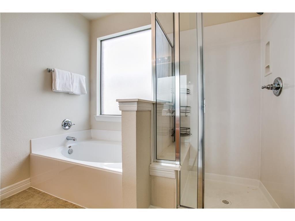 5720 Pebble Ridge Drive McKinney, TX 75070 - Photo 15 of 24 Master bath with separate shower and tub.