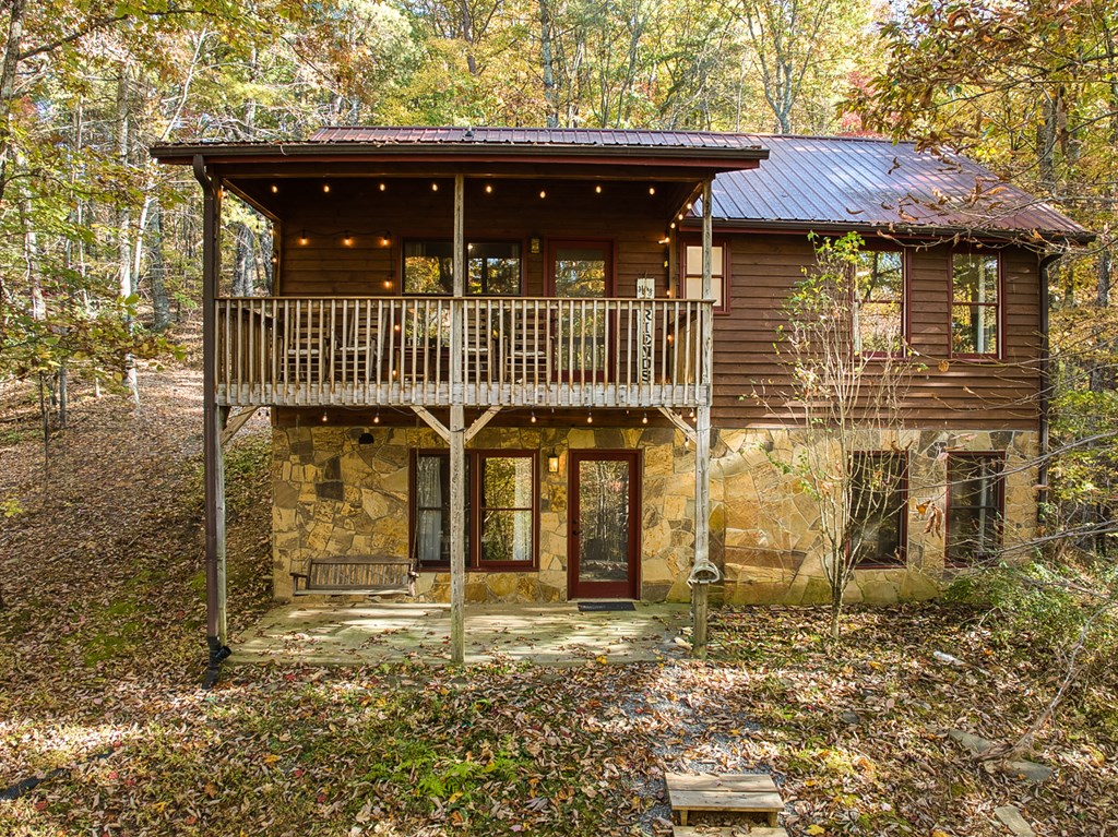 180 Green Ridge Road Blue Ridge, GA 30513 - Photo 28 of 83 a front view of a house with a yard