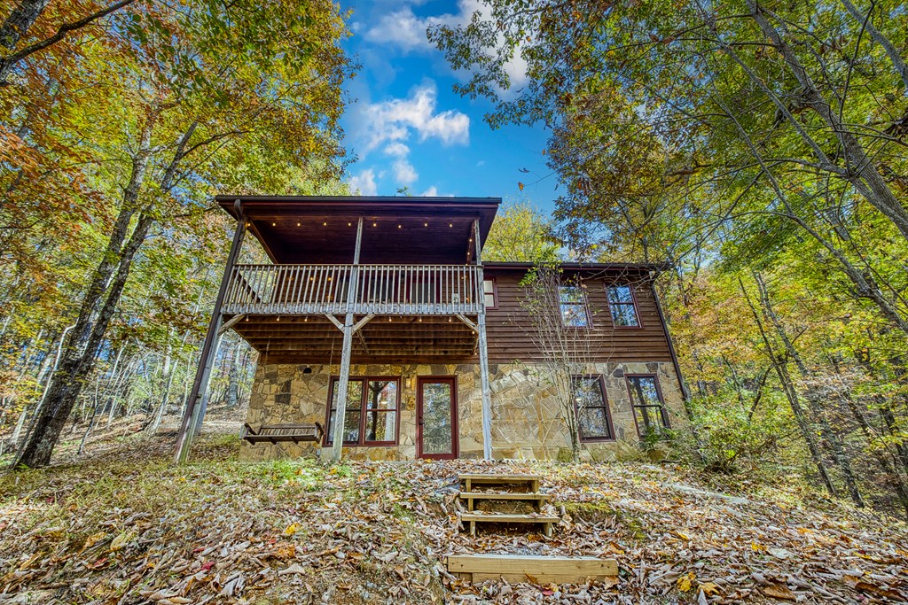 180 Green Ridge Road Blue Ridge, GA 30513 - Photo 30 of 83 front view of a house with a tree