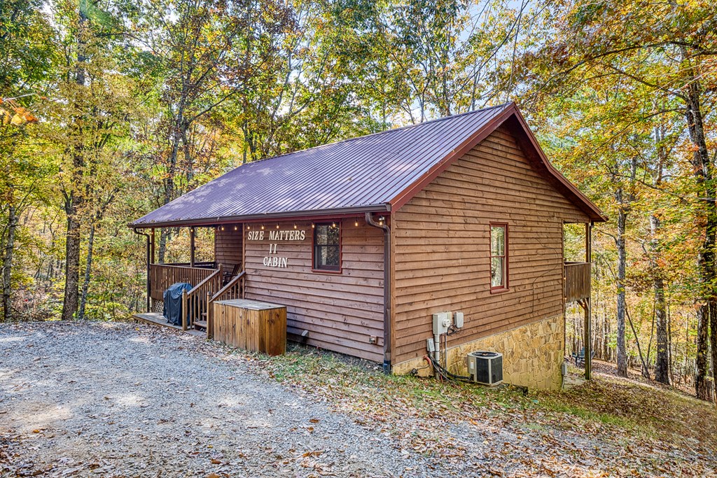180 Green Ridge Road Blue Ridge, GA 30513 - Photo 32 of 83 a view of a house with a yard