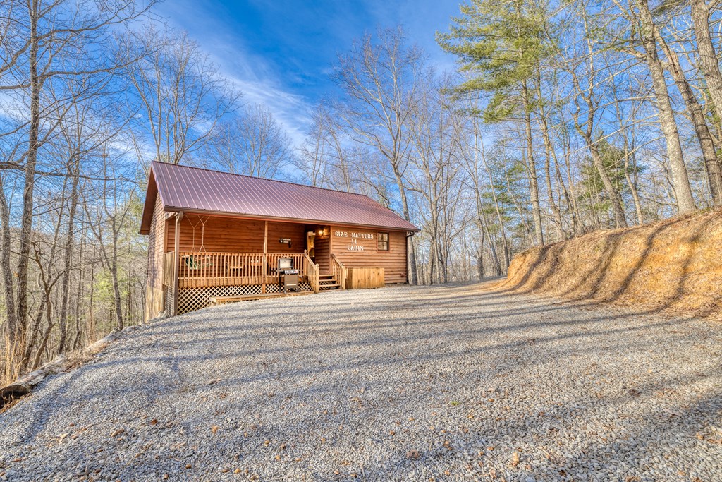 180 Green Ridge Road Blue Ridge, GA 30513 - Photo 53 of 83 a view of a house with a yard and tree s