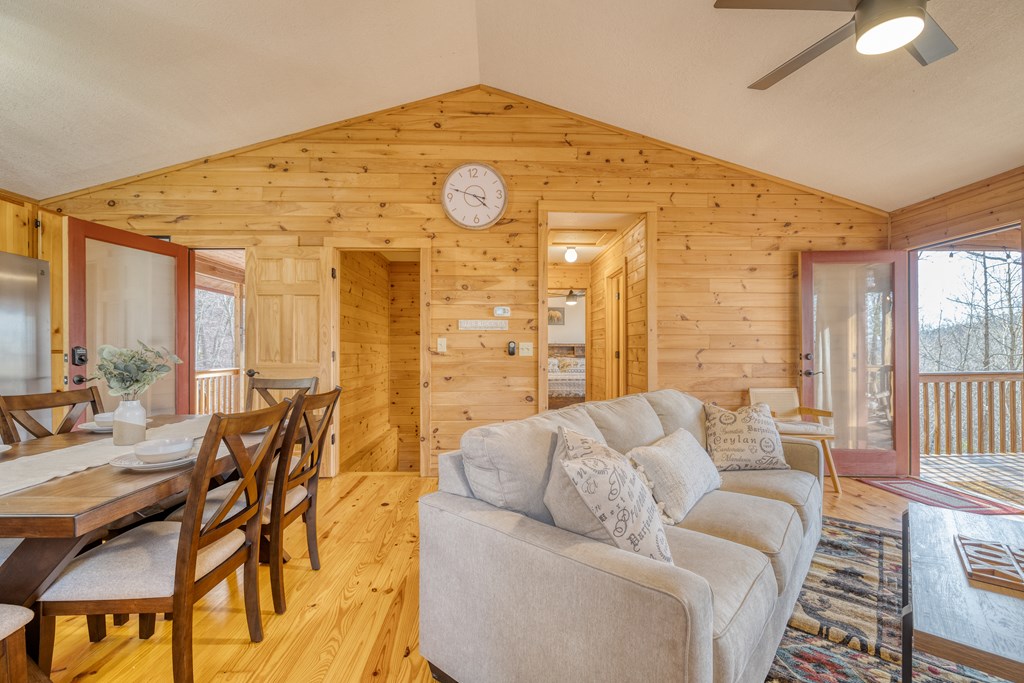 180 Green Ridge Road Blue Ridge, GA 30513 - Photo 62 of 83 a living room with furniture and a large window