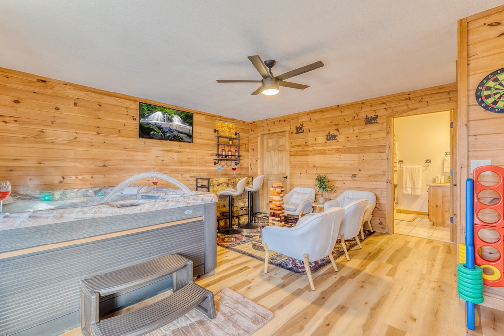 180 Green Ridge Road Blue Ridge, GA 30513 - Photo 71 of 83 a living room with furniture and a flat screen tv