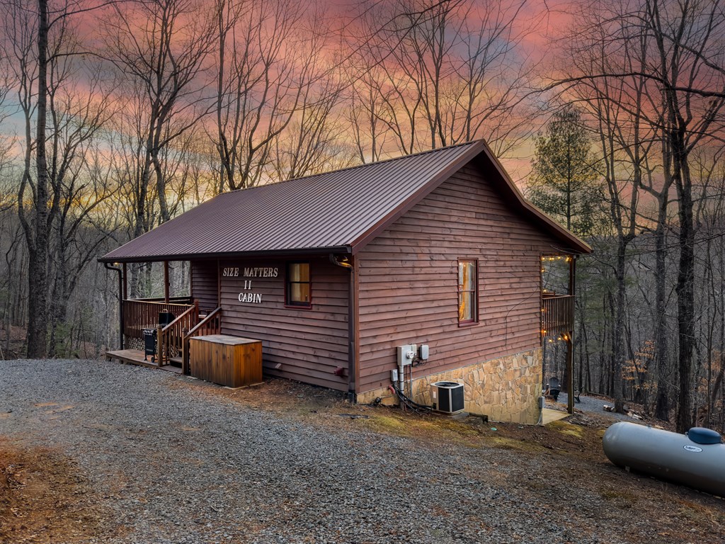 180 Green Ridge Road Blue Ridge, GA 30513 - Photo 82 of 83 a front view of a house with parking space