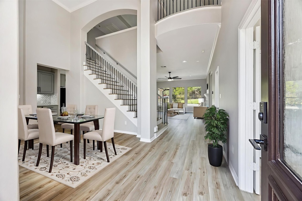 308 Calistoga Court Austin, TX 78732 - Photo 2 of 40 a view of a hallway with furniture and wooden floor